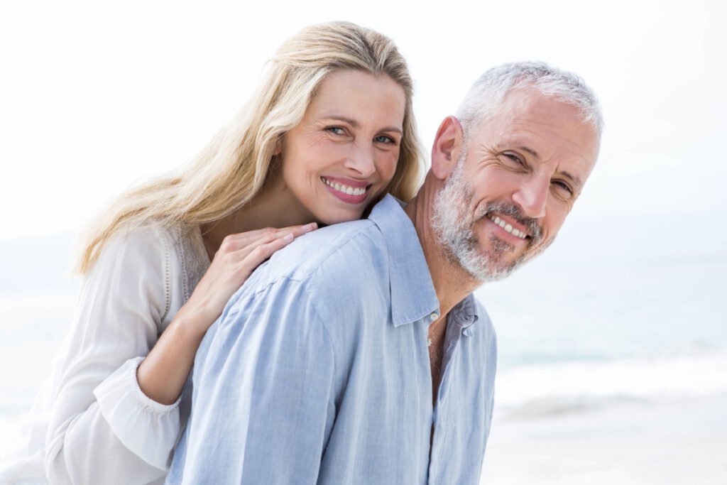 Man and woman smiling after Philadelphia LaMiNa procedure with Dr. Claytor