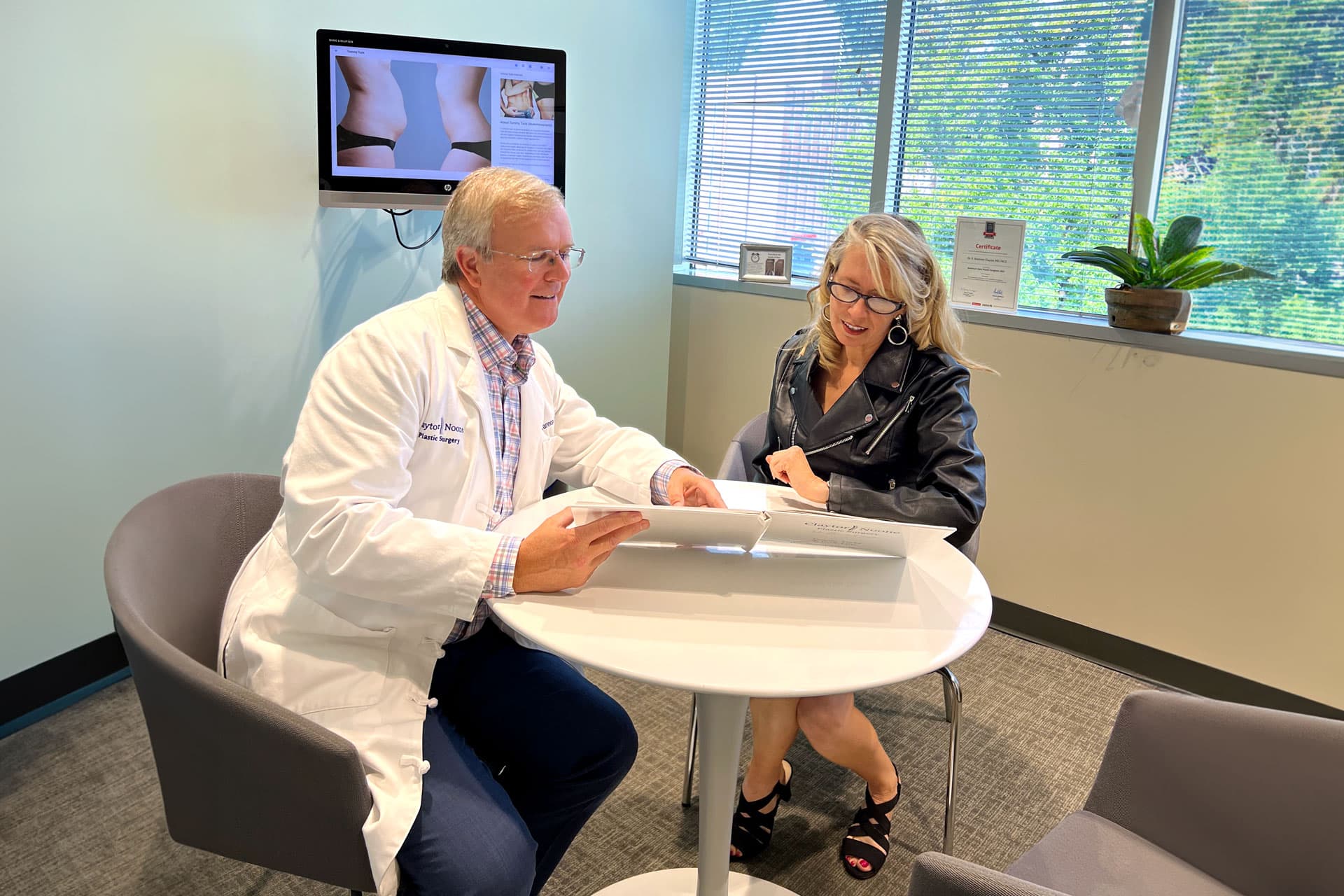 R. Brannon Claytor, MD, FACS | Board Certified Plastic Surgeon in Philadelphia & Bryn Mawr PA R. Brannon Claytor, MD, FACS, Philadelphia plastic surgeon meets with patient in a consultation