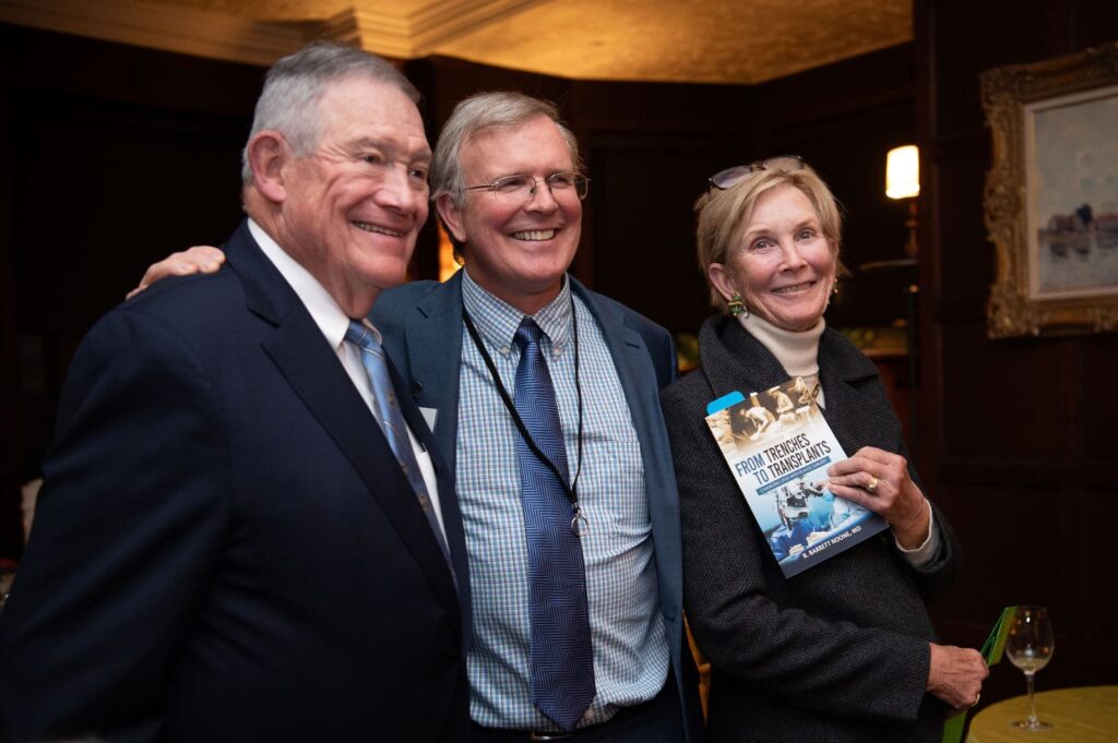 Dr. R Barrett Noone, Dr. Brannon Claytor, and others smiling at 2023 Global Aesthetics Meeting