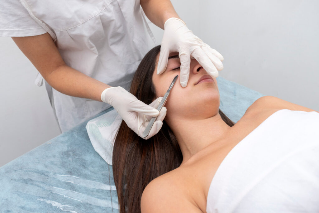 Woman getting a professional dermaplaning treatment at a medical spa
